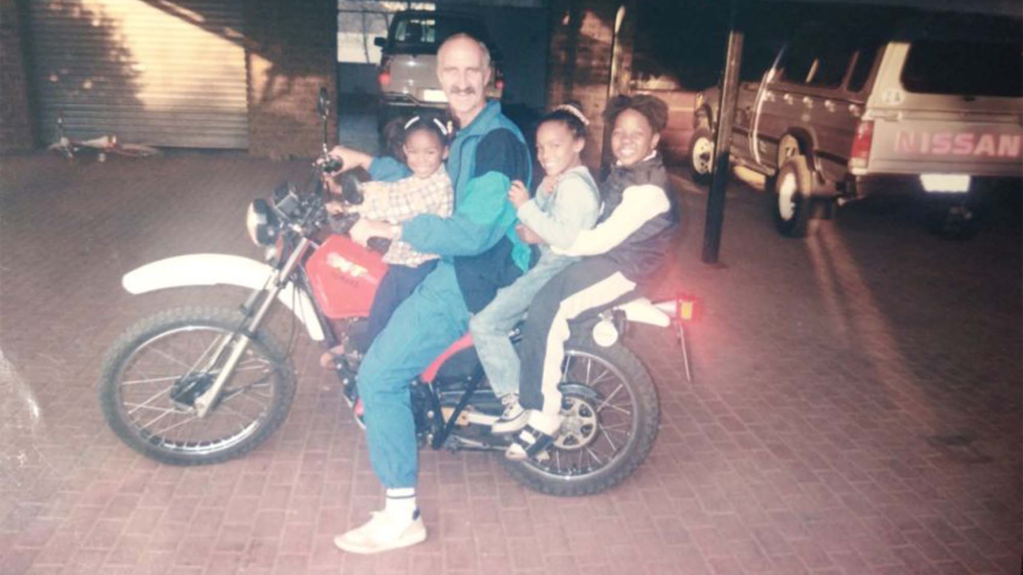 Wilco and their family on their motorbike provided by God.